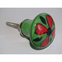 green pear shaped button and red flower