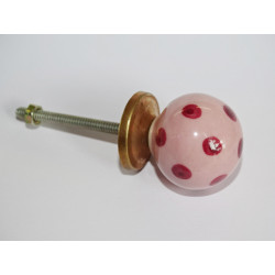            Light pink ball button with...
