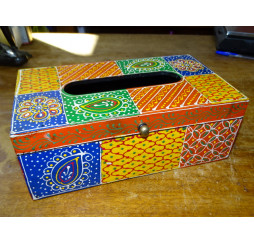 Wooden tissue box painted in relief...
