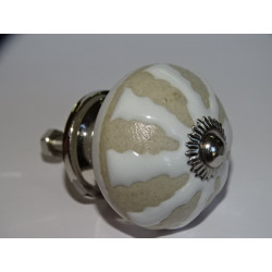 Furniture knobs with embossed spoke...