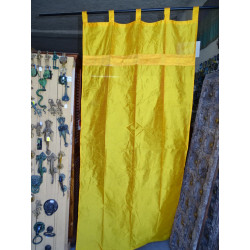 Orange-yellow taffeta curtains with a...