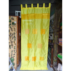 Yellow taffeta curtains with...