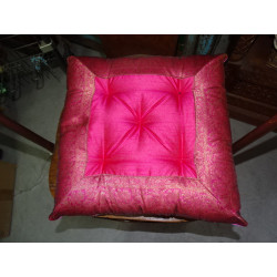 Chair pad with pink brocade edges...