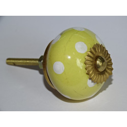             Yellow drawer knobs with...