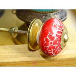             Red porcelain drawer handle...