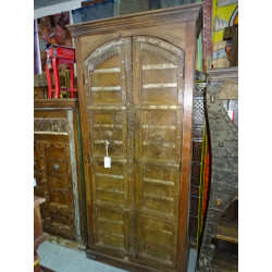 Large cabinet with old rounded doors...