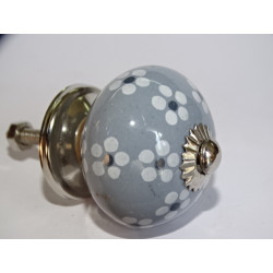 Gray furniture knobs with and small...