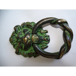 Large bronze handle with lion's head...