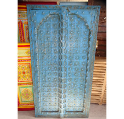 Turquoise cupboard doors with arch in...